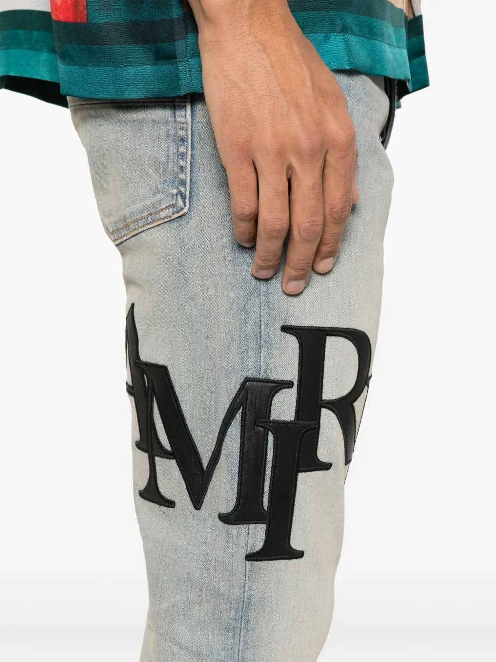 Amiri Men Skinny Jeans With Offset Logo - Black/Red AMIRI