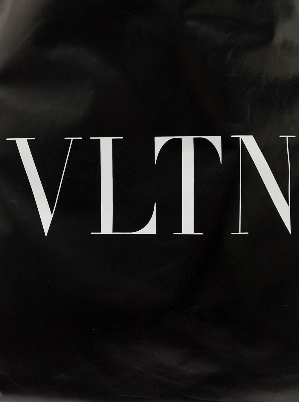 Valentino Garavani Men Valentino Garavani Men Black Backpack With Drawstring And Contrasting Vltn Print In Patent Leather Man VALENTINO GARAVANI