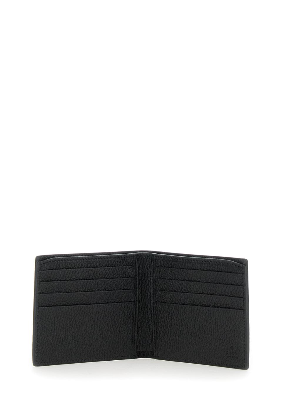 Gucci Men Black Bi-Fold Wallet With Embossed Logo Lettering On The Front In Grained Leather Man GUCCI