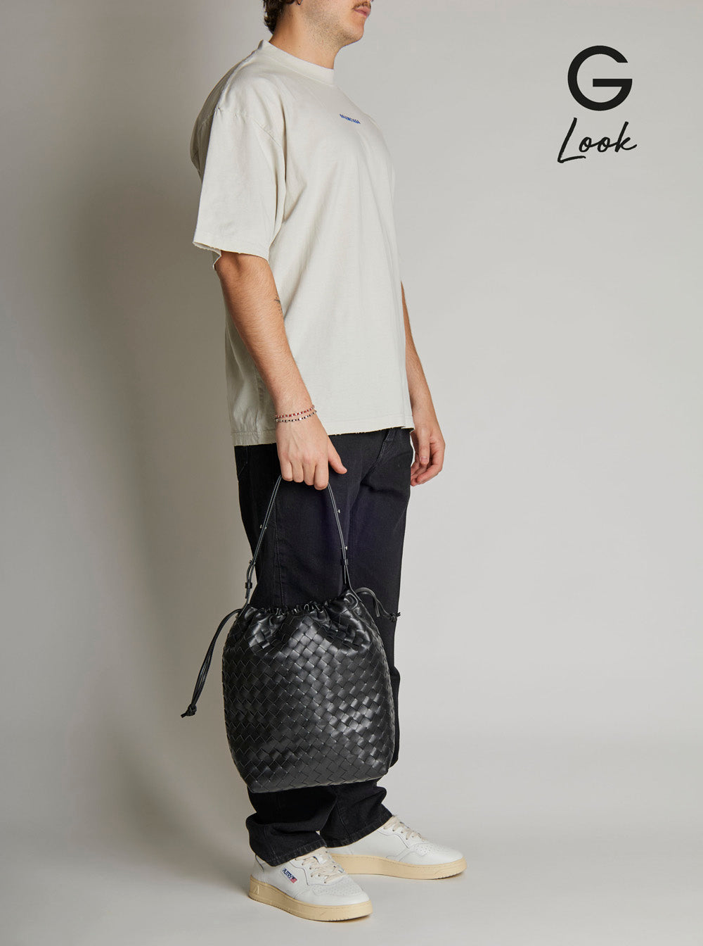 Bottega Veneta Men Black Shoulder Bag With Drawstring Closure And Intrecciato Motif In Leather Man BOTTEGA VENETA