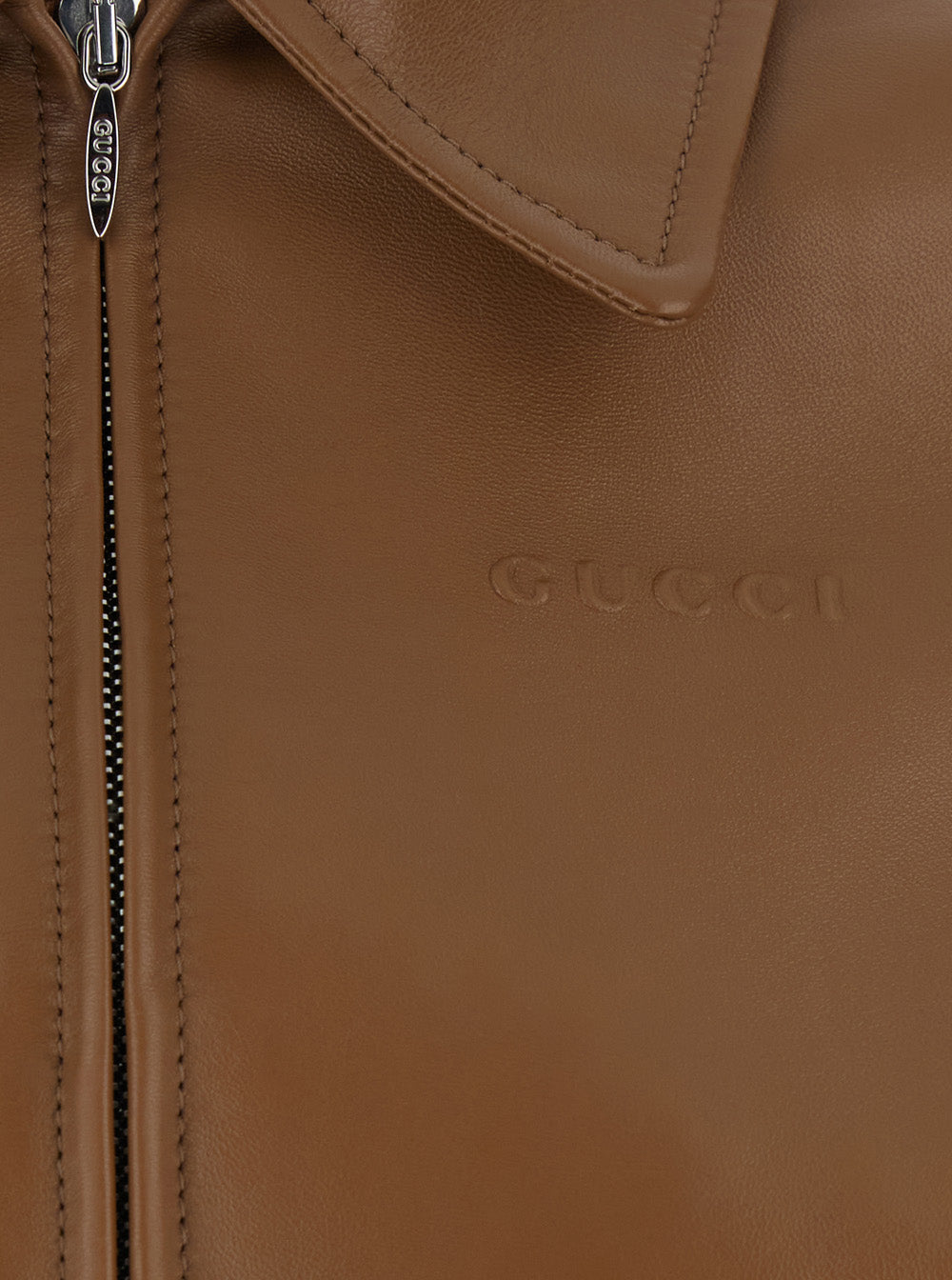 Gucci Women Brown Leather Crop Jacket With Classic Collar And Tone-On-Tone Lettering Logo On The Front For Women GUCCI