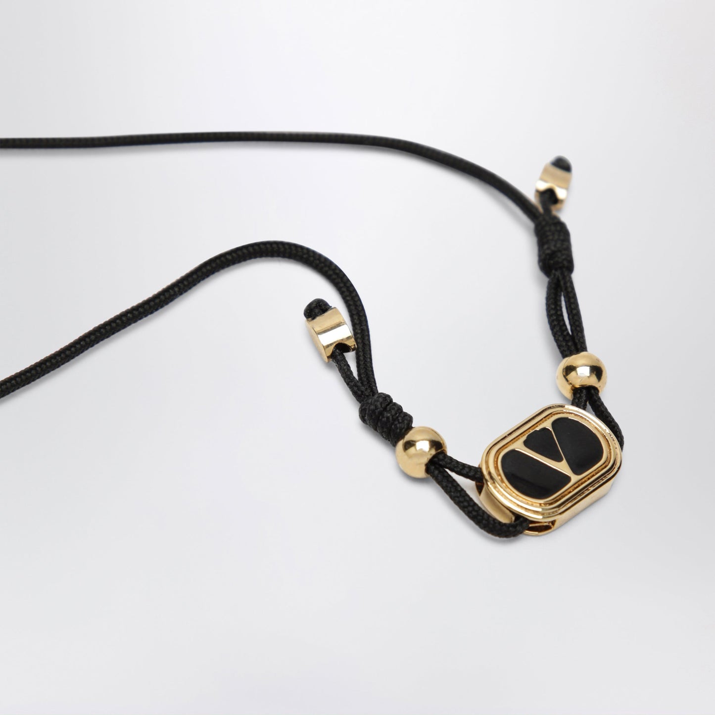 Valentino Garavani Black Cord Bracelet With Enamelled Gold V Logo Men VALENTINO GARAVANI