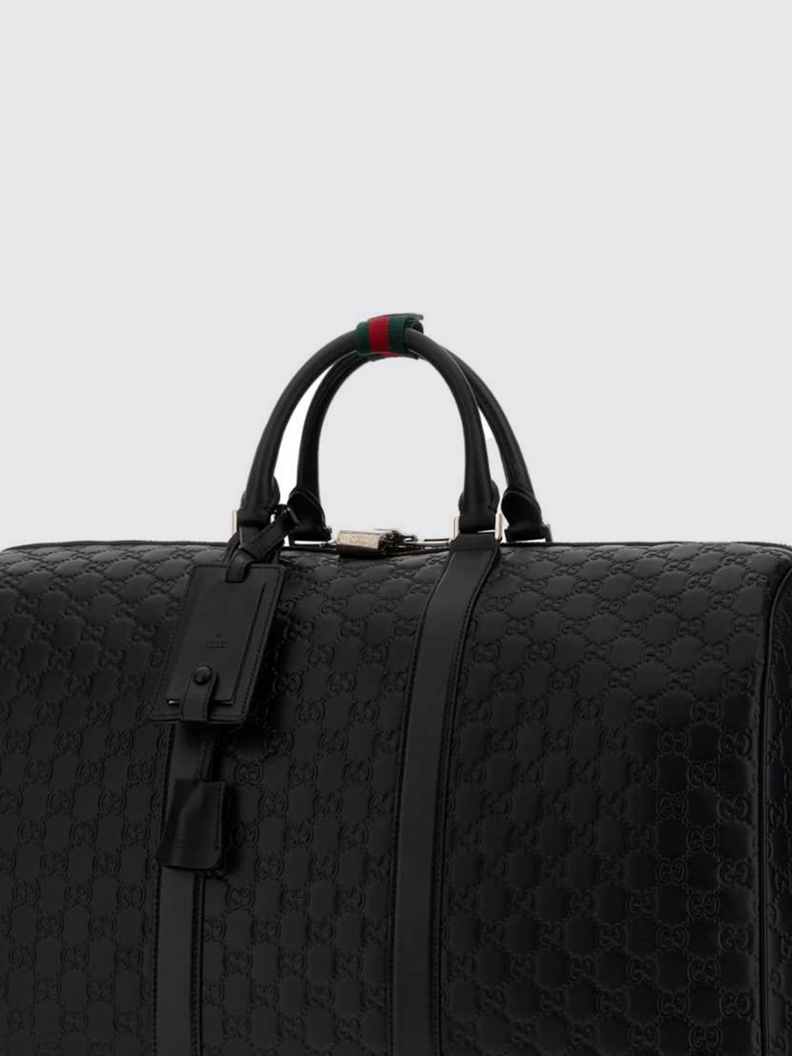 Gucci Men Gucci Gg Emblem Travel Bag In Leather With Embossed Gg Monogram GUCCI