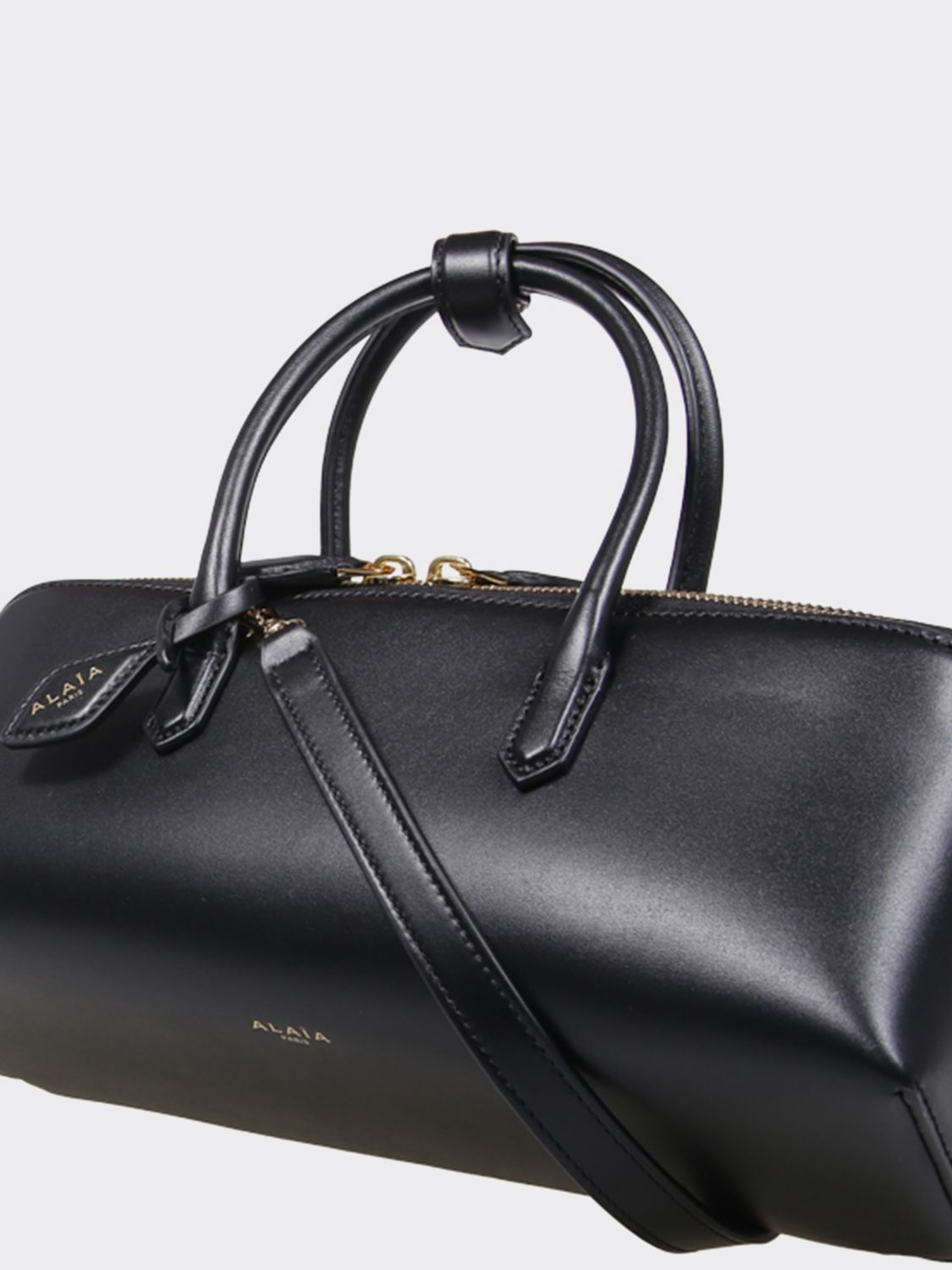 AlaiA Women Small Leather Handbag AlaiA With Double Tubular Handle And Logo Charm ALAIA