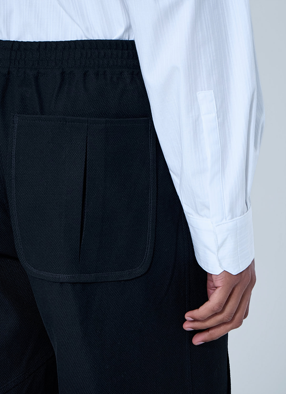 Kiko Kostadinov Men High-Waisted Pleated Trousers KIKO KOSTADINOV