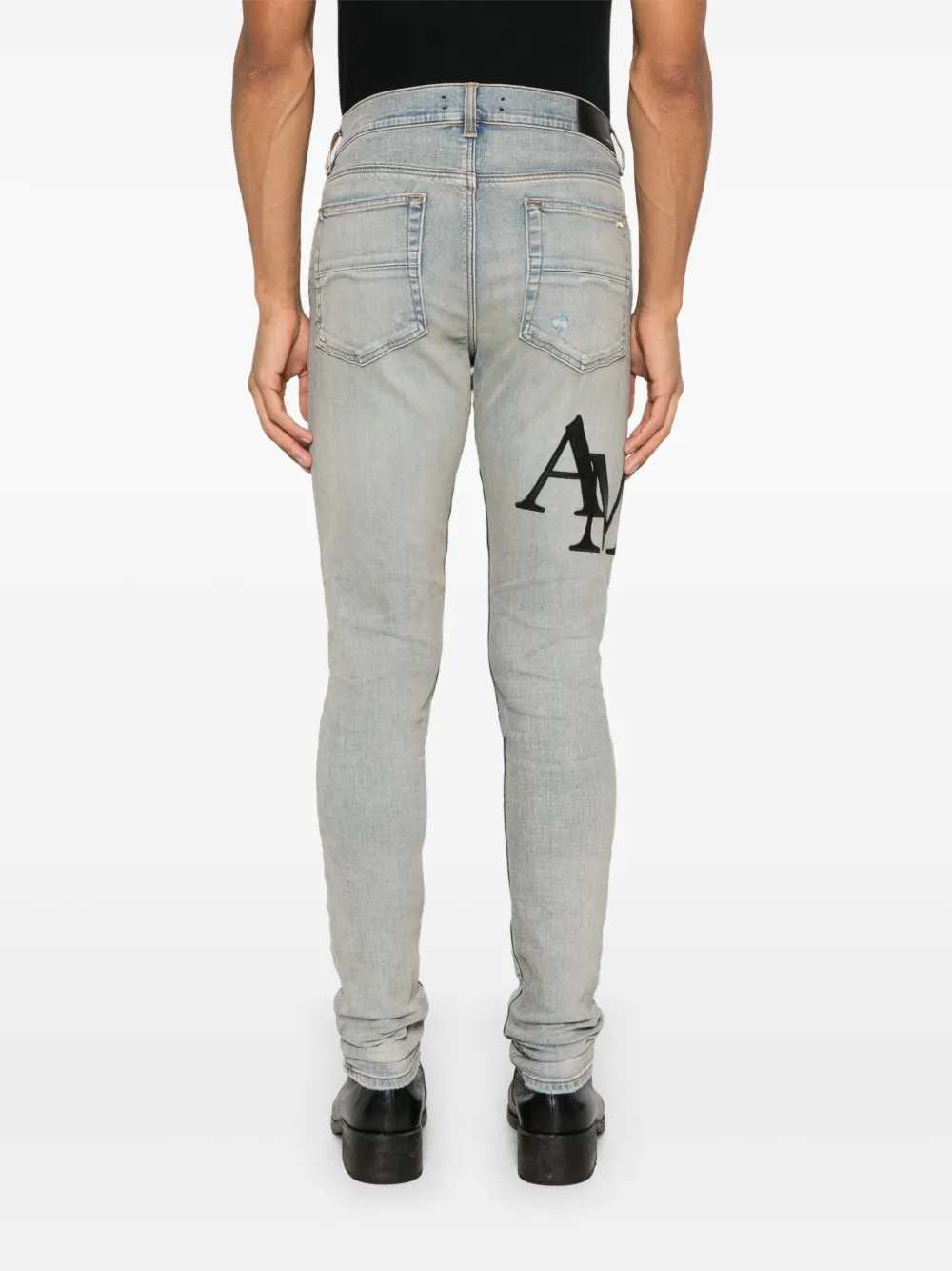 Amiri Men Skinny Jeans With Offset Logo - Black/Red AMIRI
