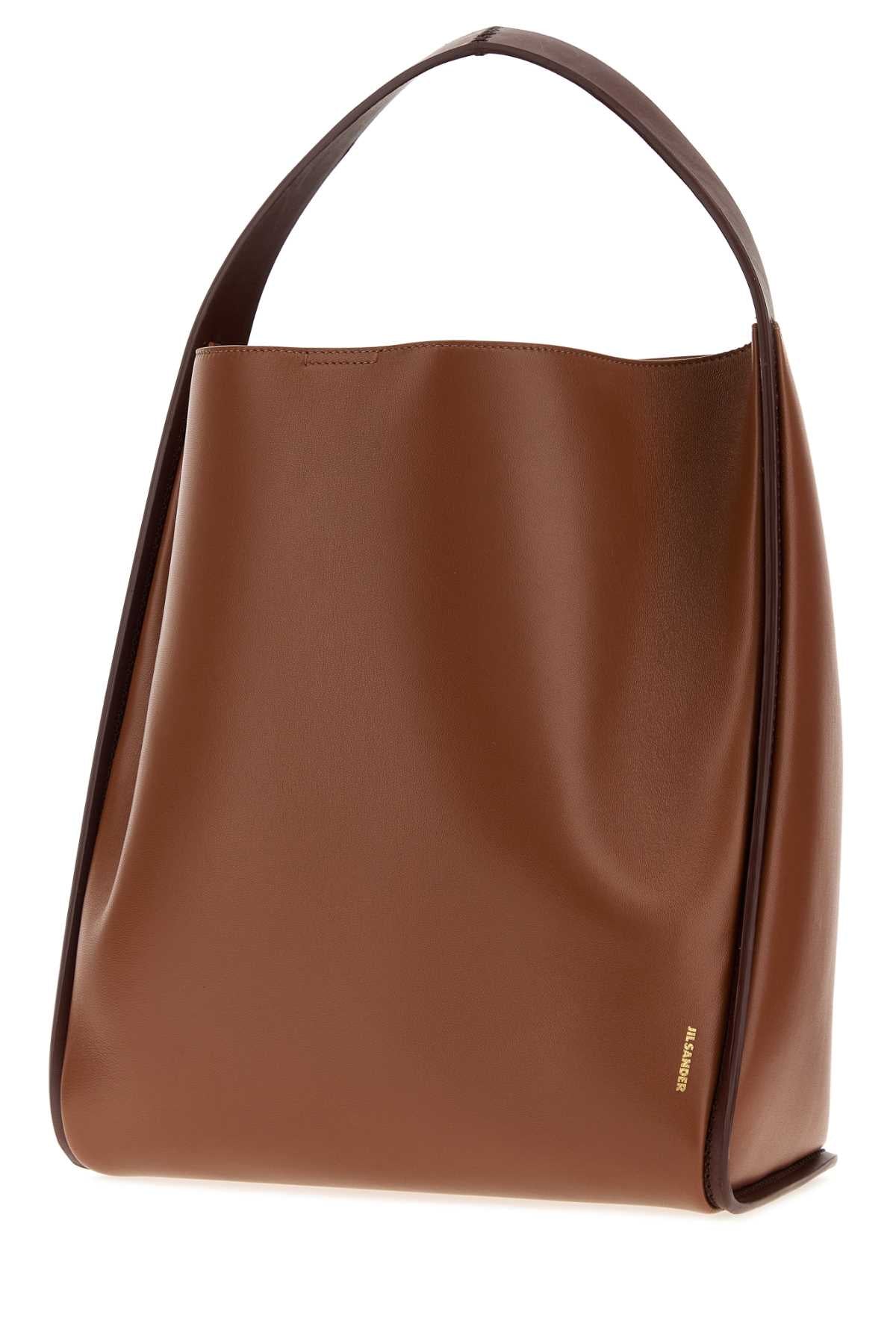 Jil Sander Women Caramel Leather Pivot Bucket Bag JIL SANDER
