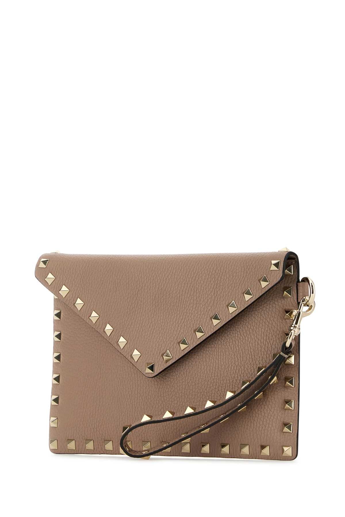 Valentino Garavani Women Antiqued Pink Leather Rockstud Clutch VALENTINO GARAVANI