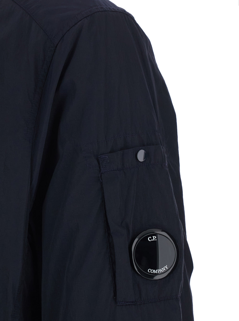 C.P. Company Men Blue Jacket With Classic Collar And Logo Plate On Sleeve In Tech Fabric Man