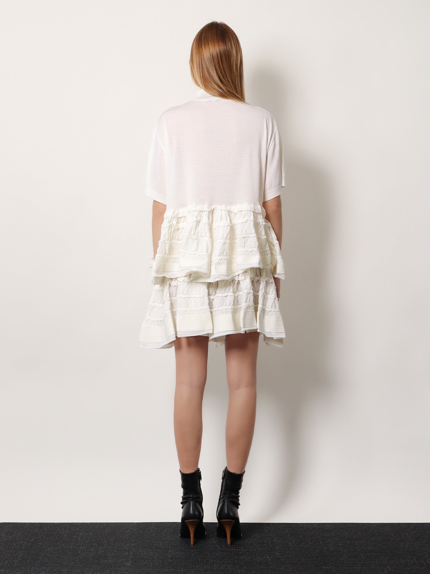 Alaia Women Peplum Virgin Wool Sweater ALAIA