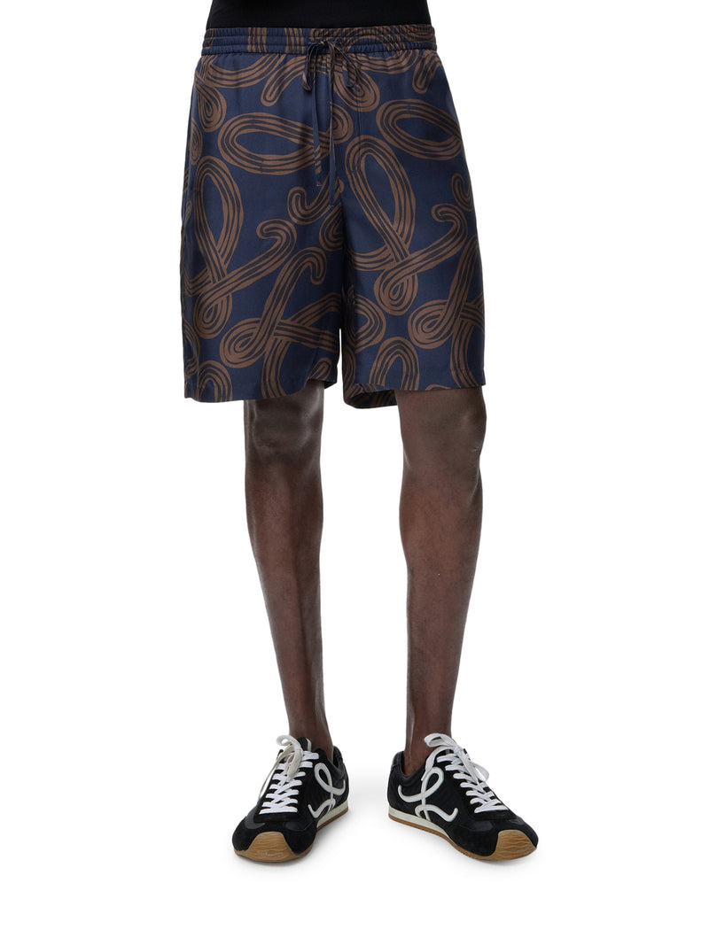 Loewe X Paula`S Ibiza Men Silk Twill Shorts With All-Over Anagram Print LOEWE