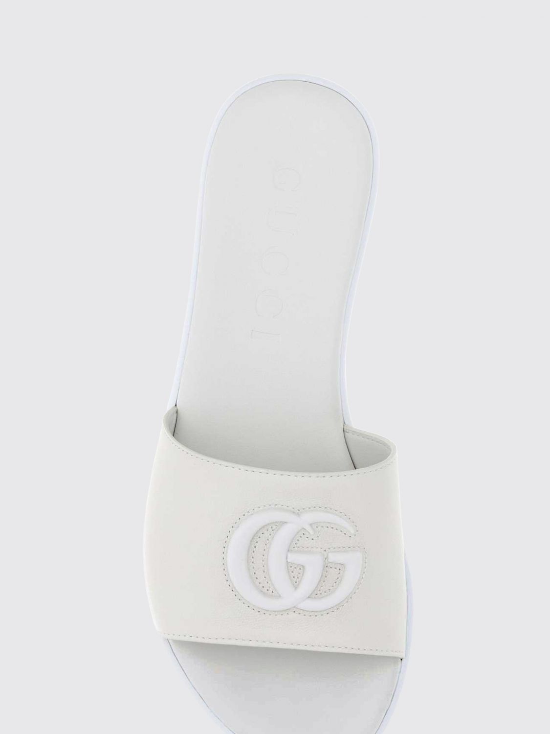 Gucci Women Gucci Calfskin Leather Slides With Embossed Gg Monogram GUCCI