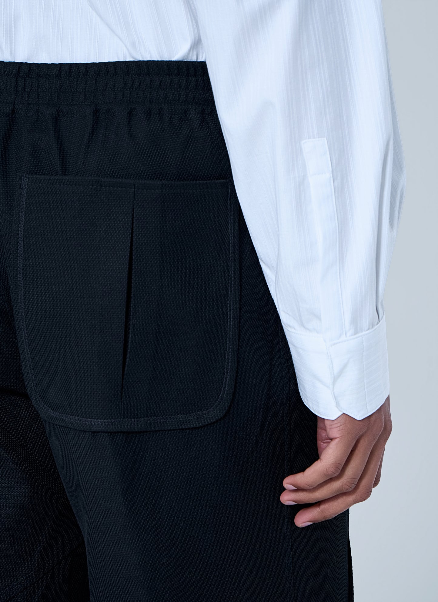 Kiko Kostadinov Men High-Waisted Pleated Trousers KIKO KOSTADINOV