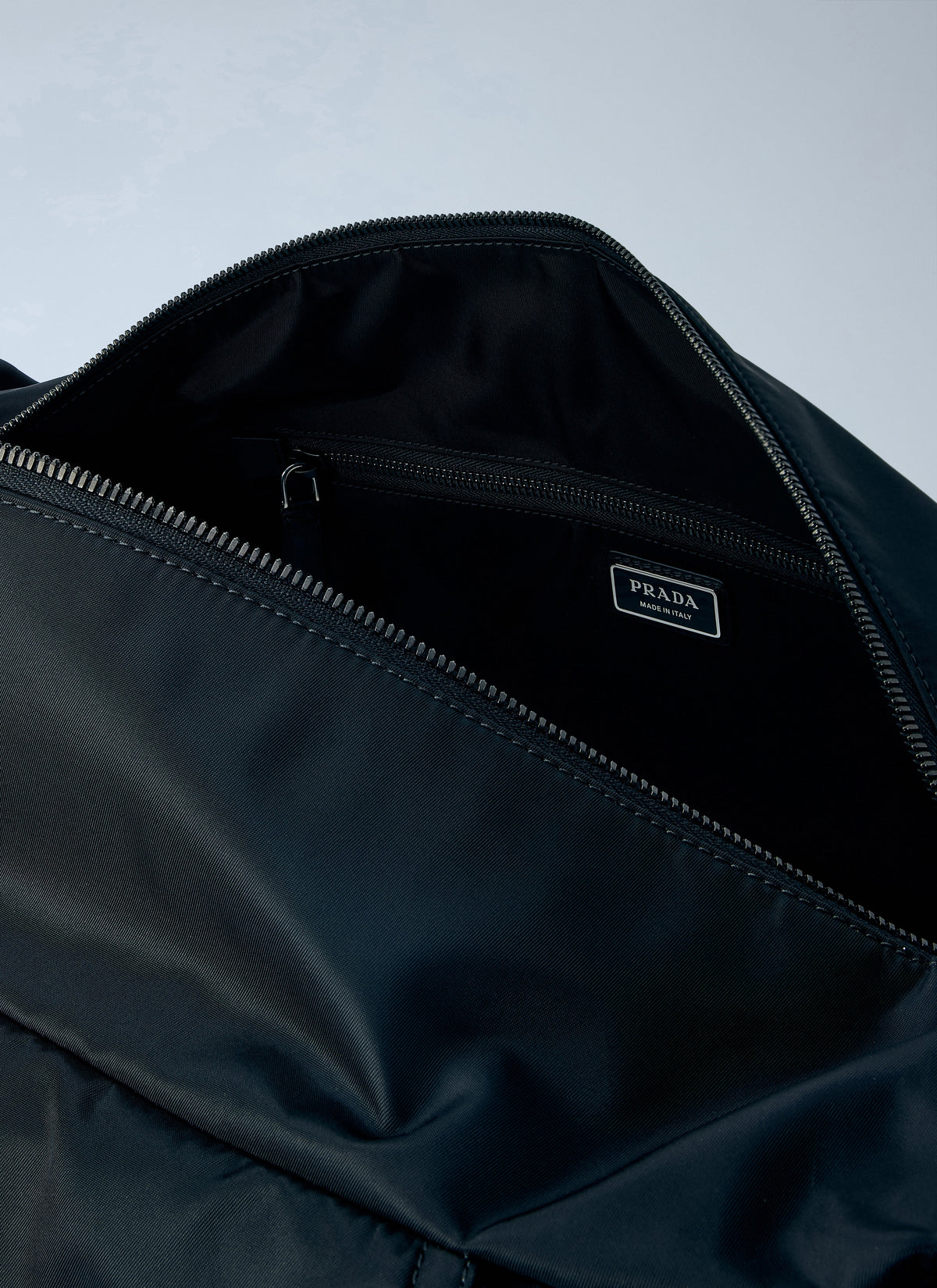 Prada Men Explore Re-Nylon And Leather Duffel Bag PRADA